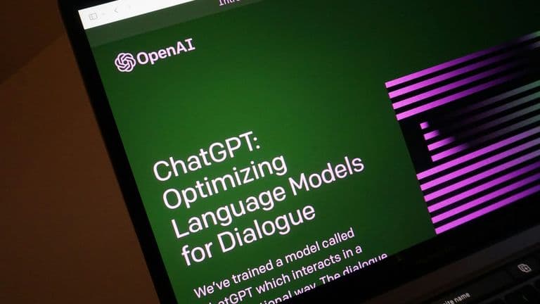 Laptop screen showing a ChatGPT conversation interface